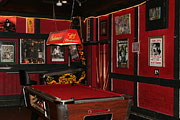 interior view of pool table and pinball machine