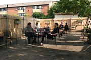 people and tables and Rocket the Dog and the great outdoors